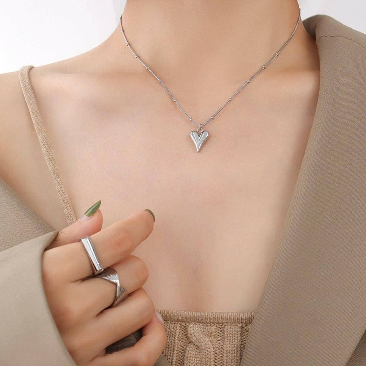 Elegant Heart Pendant Necklace in Titanium Steel with Gold PlatingUpgrade Your Style with Our Elegant Heart Pendant Necklace
 Indulge in sophistication with our exquisite heart pendant necklace crafted from ultra-durable titanium sLove Salve Elegant Heart Pendant NecklaceJewelry