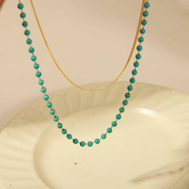 Elegant Turquoise and Gold Titanium Steel NecklaceIndulge in Timeless Elegance
 Enhance your style with the exquisite beauty of this Elegant Turquoise and Gold Titanium Steel Necklace. Crafted with precision, this dLove Salve Gold Titanium Steel NecklaceJewelry