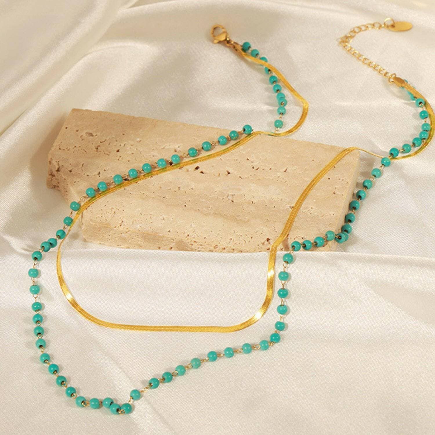 Elegant Turquoise and Gold Titanium Steel NecklaceIndulge in Timeless Elegance
 Enhance your style with the exquisite beauty of this Elegant Turquoise and Gold Titanium Steel Necklace. Crafted with precision, this dLove Salve Gold Titanium Steel NecklaceJewelry