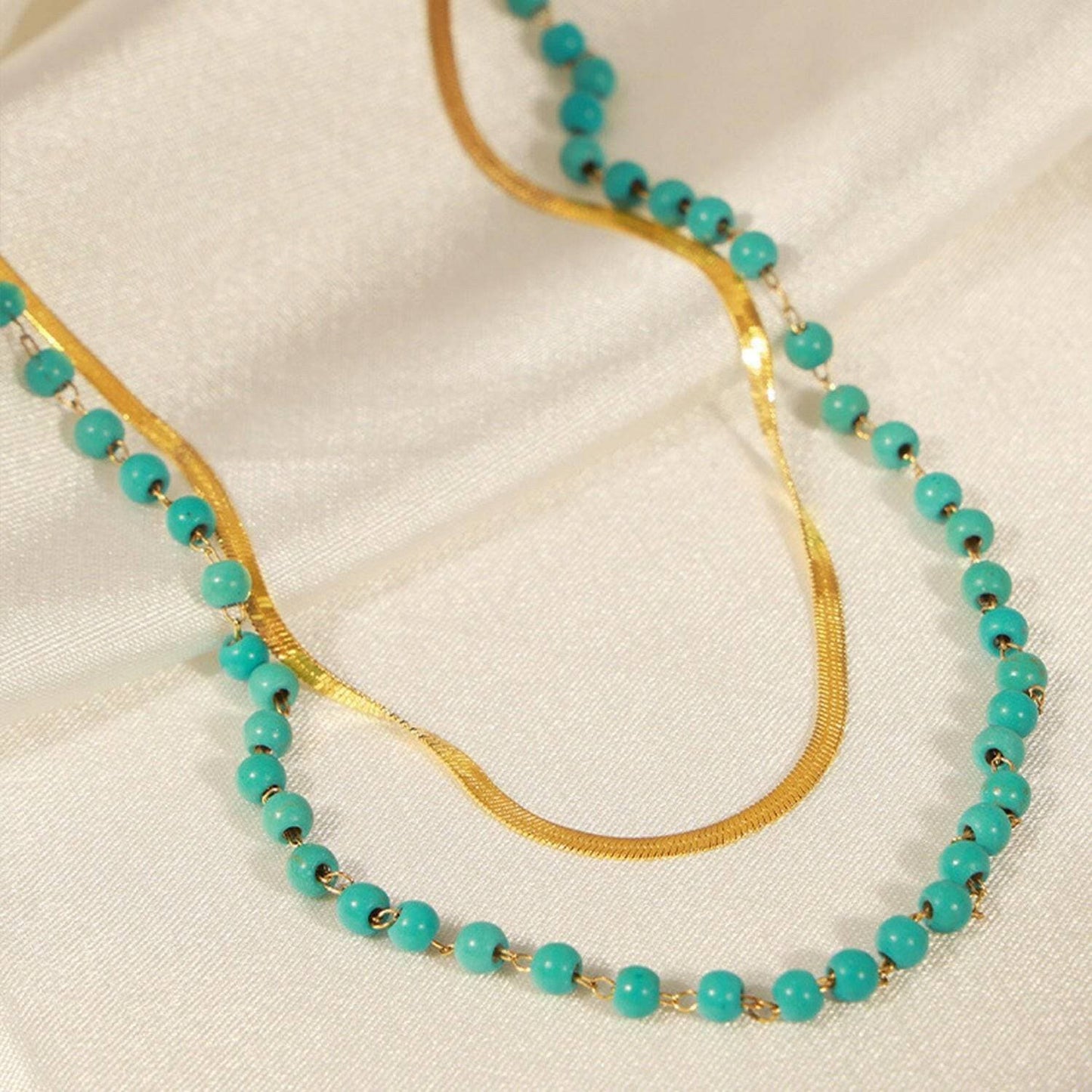 Elegant Turquoise and Gold Titanium Steel NecklaceIndulge in Timeless Elegance
 Enhance your style with the exquisite beauty of this Elegant Turquoise and Gold Titanium Steel Necklace. Crafted with precision, this dLove Salve Gold Titanium Steel NecklaceJewelry