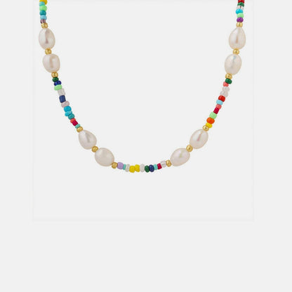 Exquisite Freshwater Pearl and Titanium Steel Necklace with Gold AccenIndulge in Elegance with Our Exquisite Freshwater Pearl and Titanium Steel Necklace
 
 Featuring lustrous freshwater pearls, durable titanium steel, and elegant glasLove Salve Exquisite Freshwater PearlJewelry