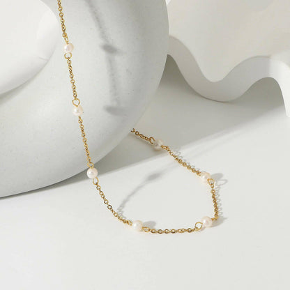 Pearl Elegance: Freshwater Pearl & 18K Gold-Plated NecklaceDiscover Timeless Elegance
 Embrace sophistication with the Pearl Elegance: Freshwater Pearl &amp; 18K Gold-Plated Necklace, a stunning statement piece that radiatesLove Salve Pearl EleganceJewelry