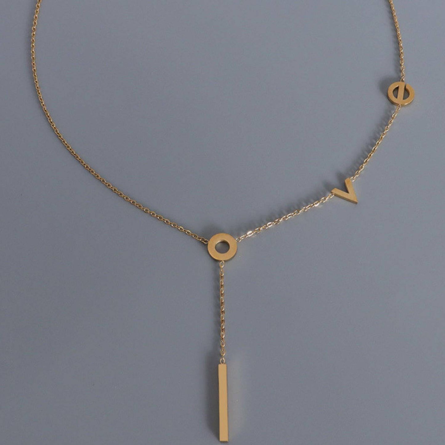 Rose Gold-Plated Titanium Steel Monogram Pendant NecklaceIntroducing the Rose Gold-Plated Titanium Steel Monogram Pendant Necklace
 Indulge in sophistication with our exquisite 18K rose gold-plated titanium steel necklace.Love Salve Rose Gold-Plated Titanium Steel Monogram Pendant NecklaceJewelry