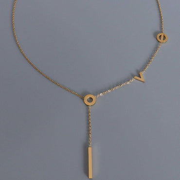 Rose Gold-Plated Titanium Steel Monogram Pendant NecklaceIntroducing the Rose Gold-Plated Titanium Steel Monogram Pendant Necklace
 Indulge in sophistication with our exquisite 18K rose gold-plated titanium steel necklace.Love Salve Rose Gold-Plated Titanium Steel Monogram Pendant NecklaceJewelry