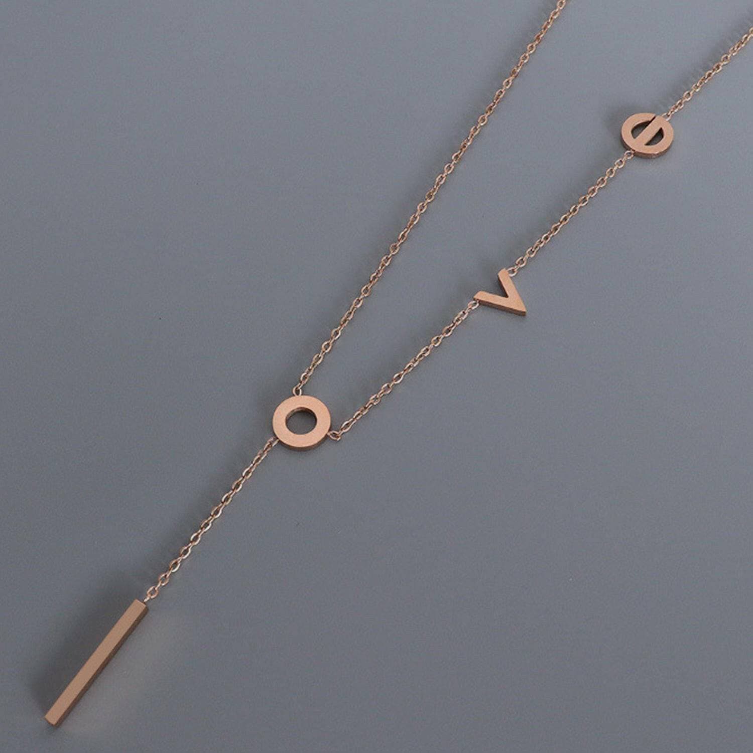 Rose Gold-Plated Titanium Steel Monogram Pendant NecklaceIntroducing the Rose Gold-Plated Titanium Steel Monogram Pendant Necklace
 Indulge in sophistication with our exquisite 18K rose gold-plated titanium steel necklace.Love Salve Rose Gold-Plated Titanium Steel Monogram Pendant NecklaceJewelry