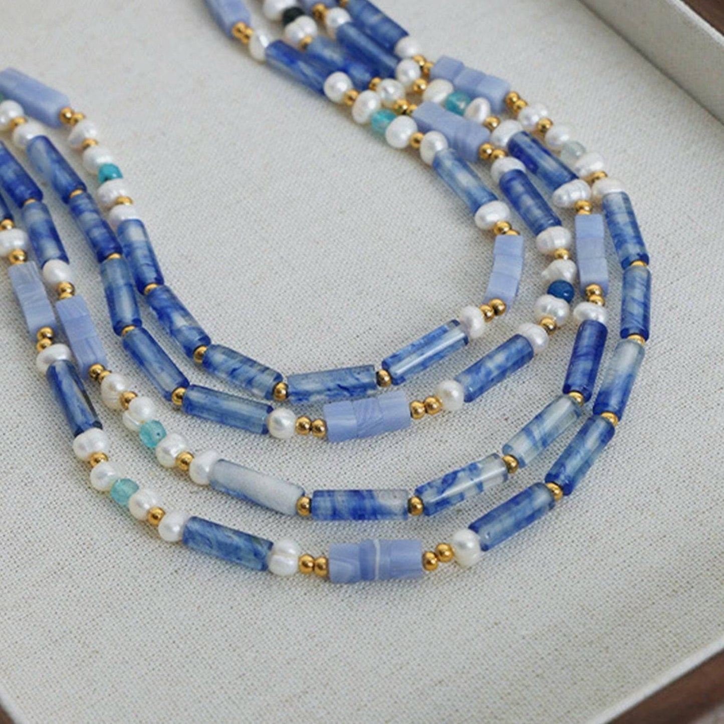 Chic blue chalcedony geometric necklace with pearls and titanium accents