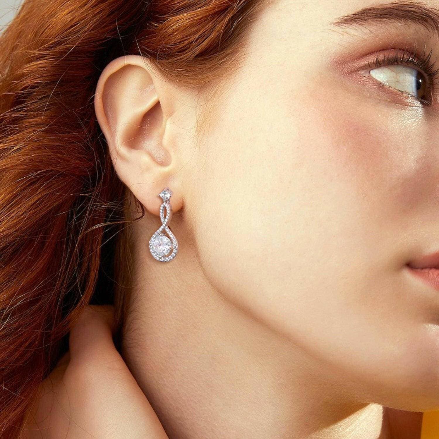 Shimmering Brilliance: 1 Carat Moissanite Sterling Silver Earrings witExperience Unmatched Elegance:
 Indulge in the allure of luxury with our Shimmering Brilliance: 1 Carat Moissanite Sterling Silver Earrings. Elevate your ensemble wiLove Salve 1 Carat Moissanite Sterling Silver EarringsJewelry