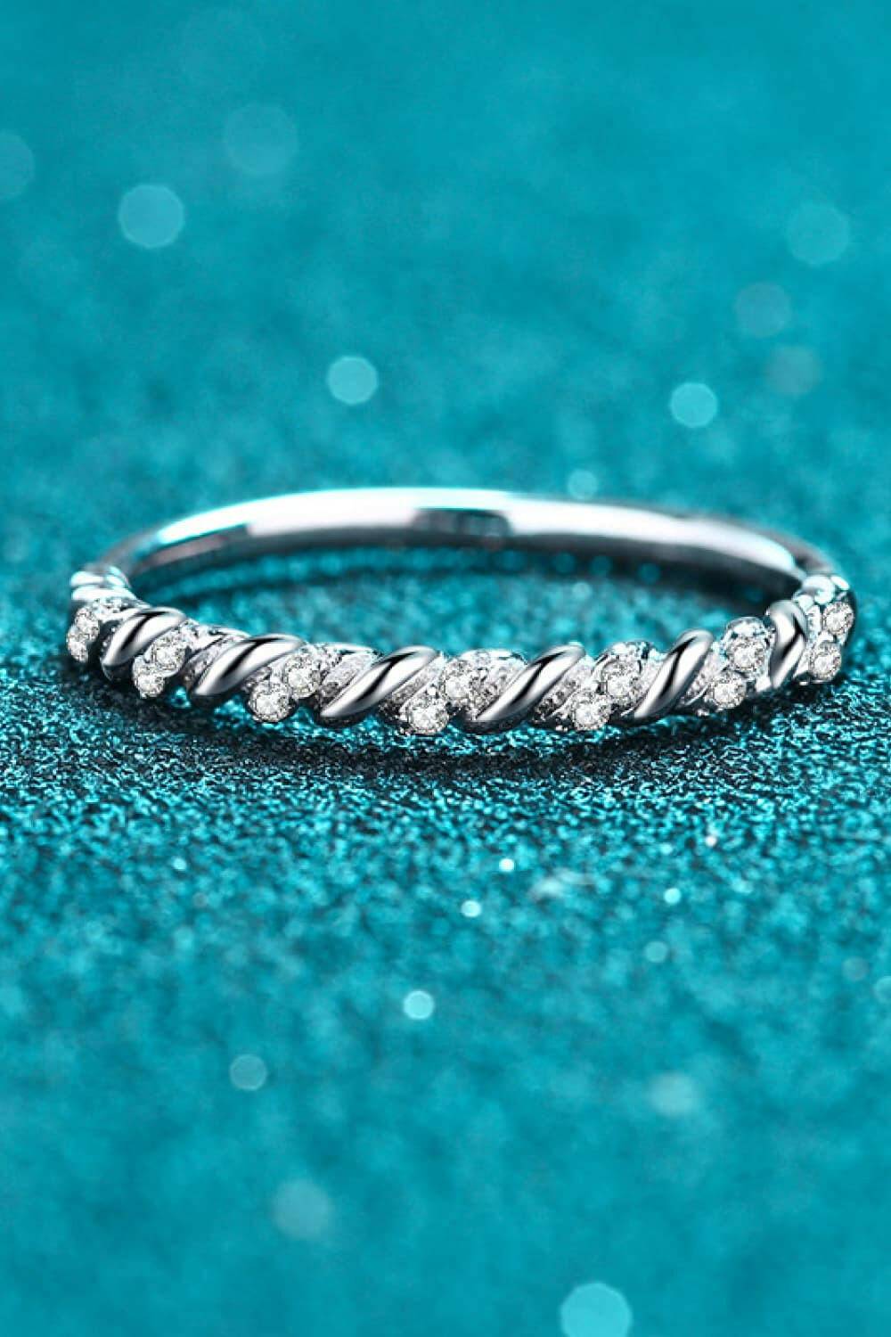 Elegant Sterling Silver Ring with Moissanite Half-Eternity SparkleExperience Timeless Elegance with Our Sterling Silver Moissanite Ring
 
 
Metal: Crafted from high-quality 925 sterling silver
 
Stones: Adorned with dazzling moissaLove Salve Elegant Sterling Silver RingJewelry