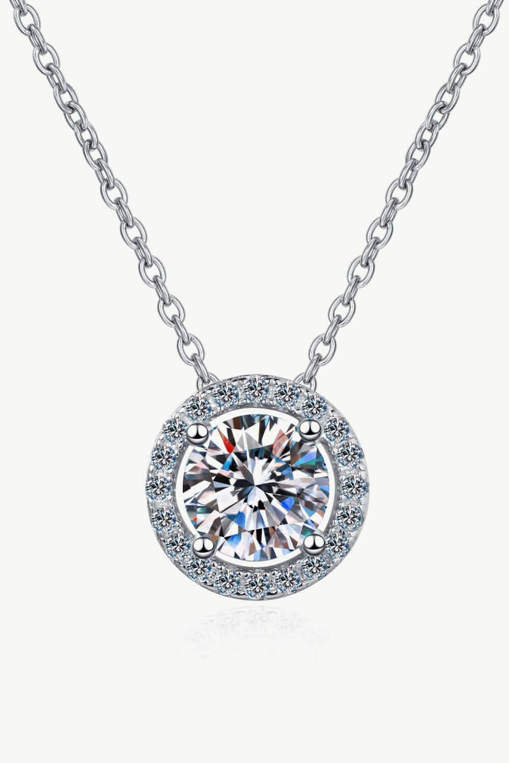 1 Carat Moissanite Round Pendant Necklace in Sterling Silver - SparkliExperience Timeless Elegance with our 1 Carat Moissanite Round Pendant Necklace
 
 
Certified Brilliance: Featuring a stunning Moissanite stone over 0.3 carats, thisLove Salve 1 Carat Moissanite Round Pendant NecklaceJewelry