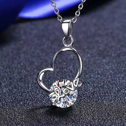 Heart-Shaped Moissanite Necklace in Sterling Silver with 2 Carat SparkExperience Timeless Elegance with Our Heart-Shaped Moissanite Necklace
 
 
Sparkling Brilliance: Embrace the shimmer of a 2 carat heart-shaped Moissanite stone
 
PreLove Salve Heart-Shaped Moissanite NecklaceJewelry