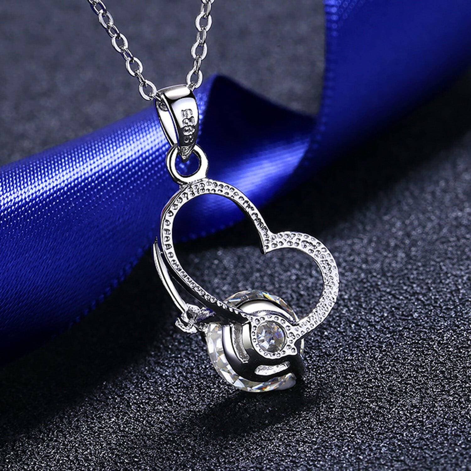 Heart-Shaped Moissanite Necklace in Sterling Silver with 2 Carat SparkExperience Timeless Elegance with Our Heart-Shaped Moissanite Necklace
 
 
Sparkling Brilliance: Embrace the shimmer of a 2 carat heart-shaped Moissanite stone
 
PreLove Salve Heart-Shaped Moissanite NecklaceJewelry