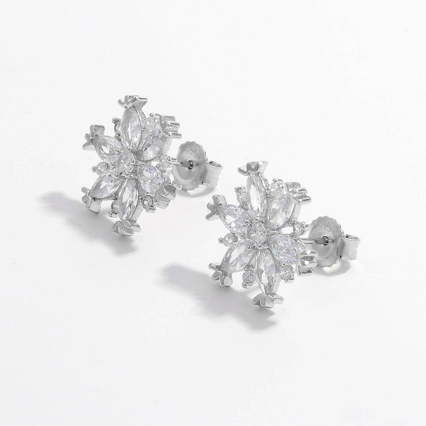 Snowflake Zircon Earrings - Sterling Silver Winter SparkleSnowflake Zircon Earrings - Sterling Silver Winter Sparkle
 **Elevate your outfit with the enchanting Winter Sparkle of these Snowflake Zircon Earrings.**
 Key FeatuLove Salve Snowflake Zircon Earrings - Sterling Silver Winter SparkleJewelry