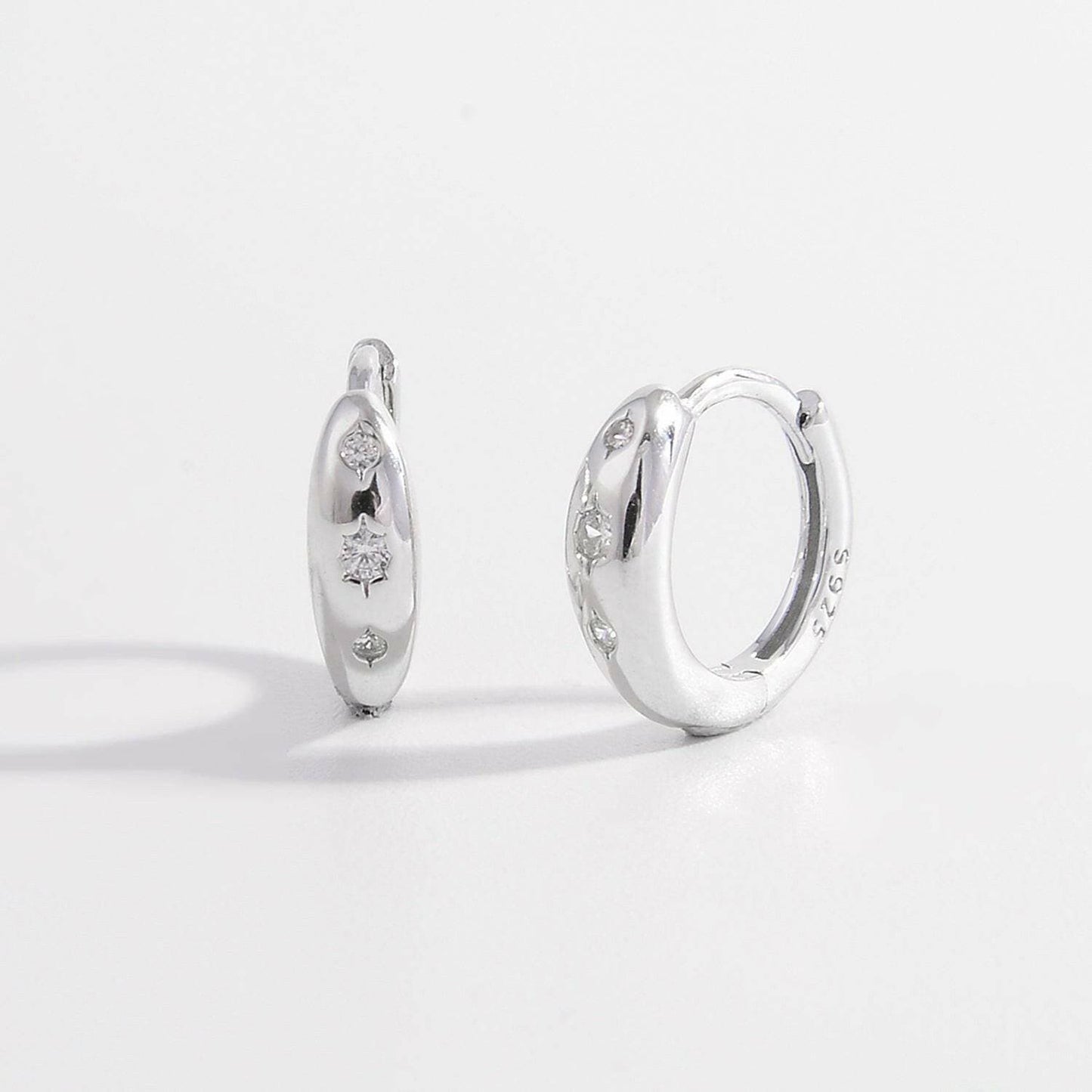 Zircon and Sterling Silver Huggie Earrings with Anti-Tarnish Care InstExperience Elegance: Zircon and Sterling Silver Huggie Earrings
 
 
Material: Crafted with precision using premium 925 sterling silver
 
Design: Adorned with dazzlinLove Salve Sterling Silver Huggie EarringsJewelry