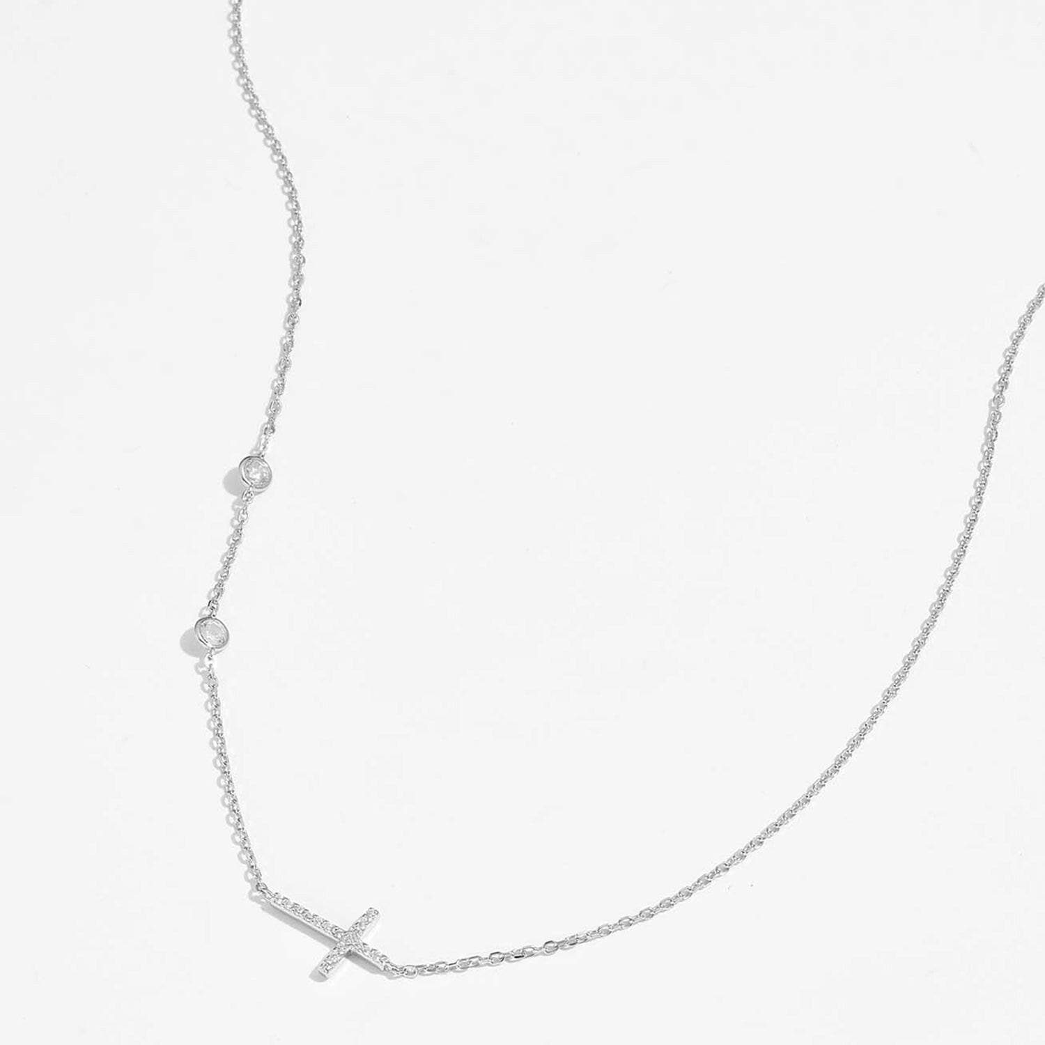 Zircon Cross Necklace: Stunning 925 Sterling Silver Pendant on Gold-PlZircon Cross Necklace: Stunning 925 Sterling Silver Pendant on Gold-Plated Chain
 Indulge in timeless elegance with the Zircon Cross Necklace, a masterpiece crafted Love Salve Stunning 925 Sterling Silver PendantJewelry