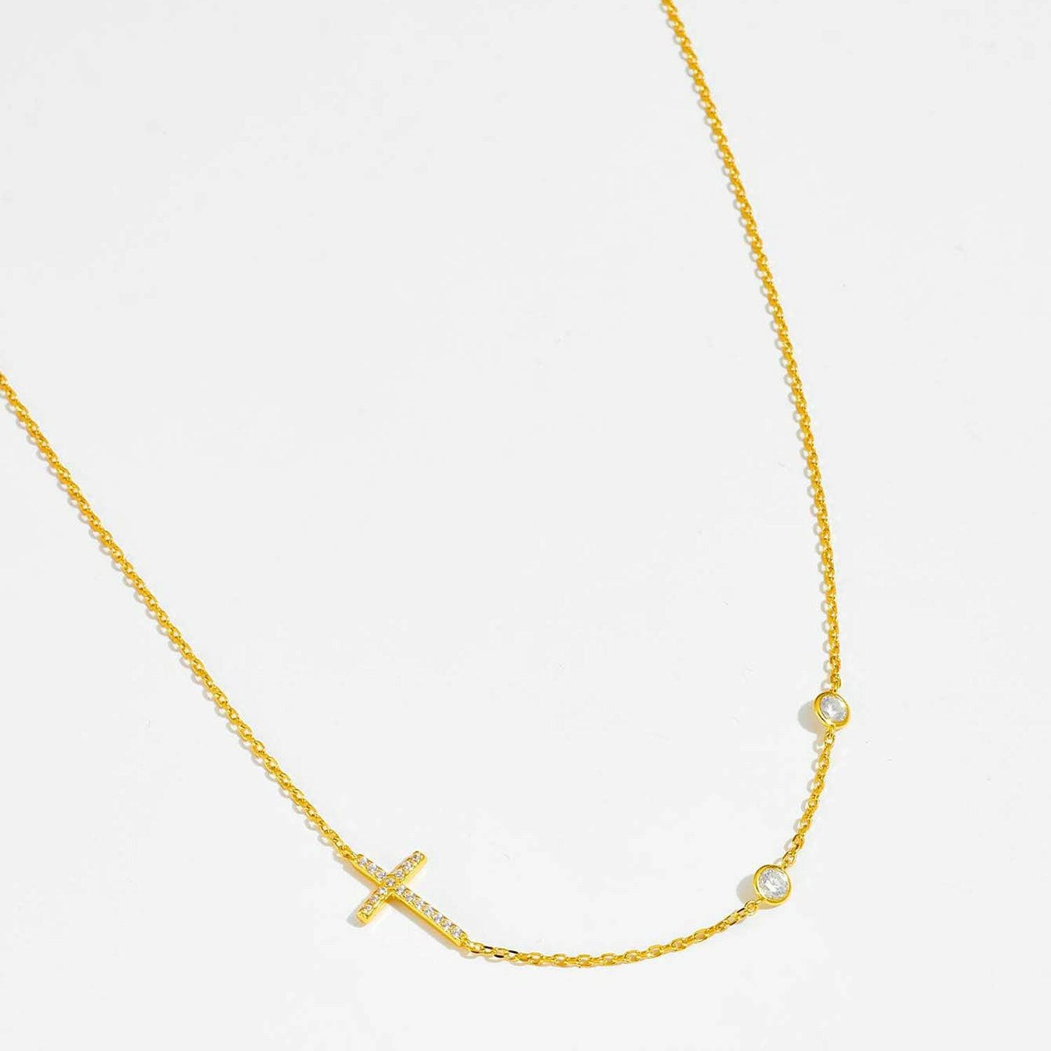 Zircon Cross Necklace: Stunning 925 Sterling Silver Pendant on Gold-PlZircon Cross Necklace: Stunning 925 Sterling Silver Pendant on Gold-Plated Chain
 Indulge in timeless elegance with the Zircon Cross Necklace, a masterpiece crafted Love Salve Stunning 925 Sterling Silver PendantJewelry