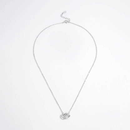 Zircon-encrusted heart pendant in sterling silver with elegant craftsmanship