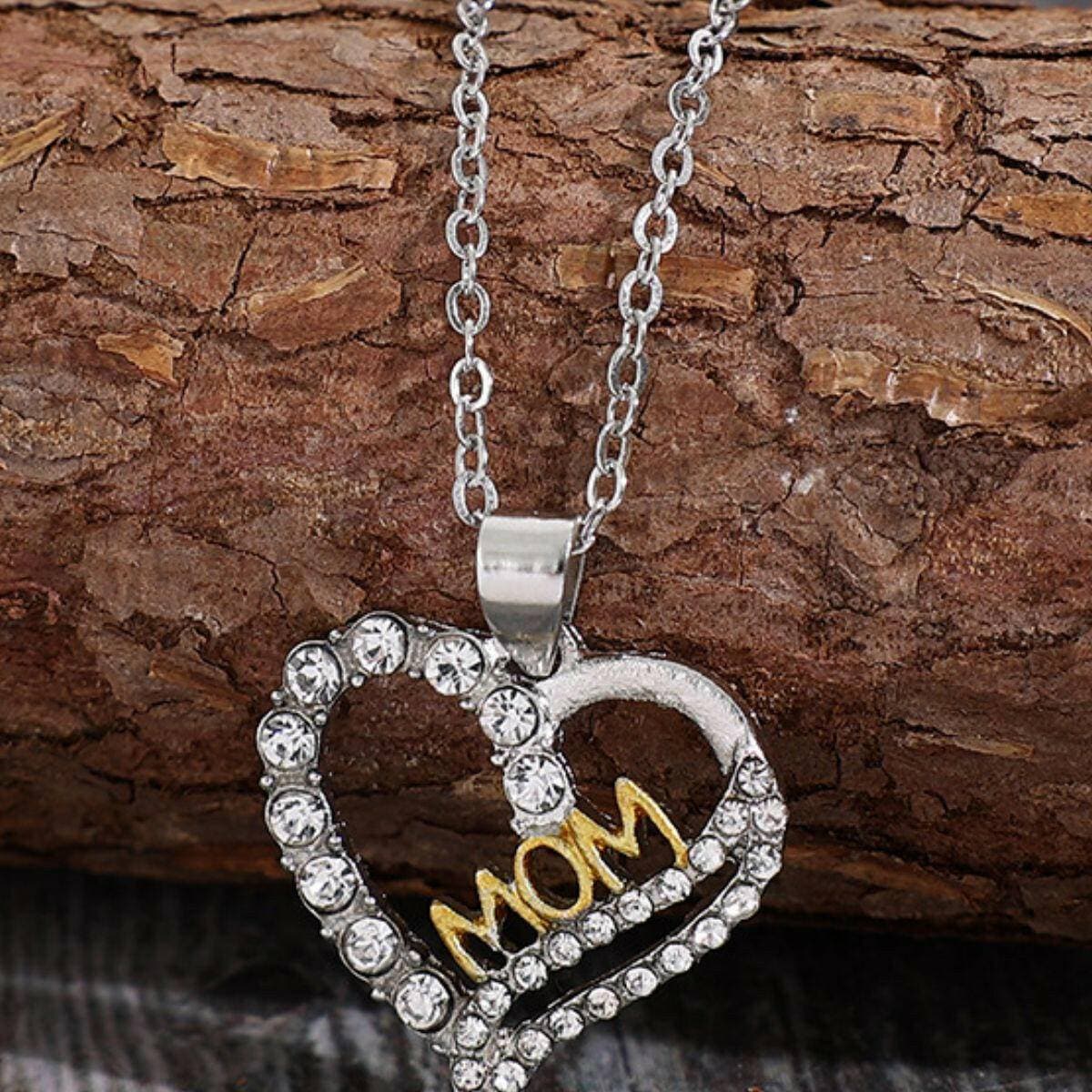 Zircon Heart Pendant Necklace: Elegant Alloy Jewelry with Sparkling DeSparkle in Style with our Zircon Heart Pendant Necklace
 Indulge in sophistication and elegance with our exquisite Zircon Heart Pendant Necklace. Elevate your look wLove Salve Zircon Heart Pendant NecklaceJewelry