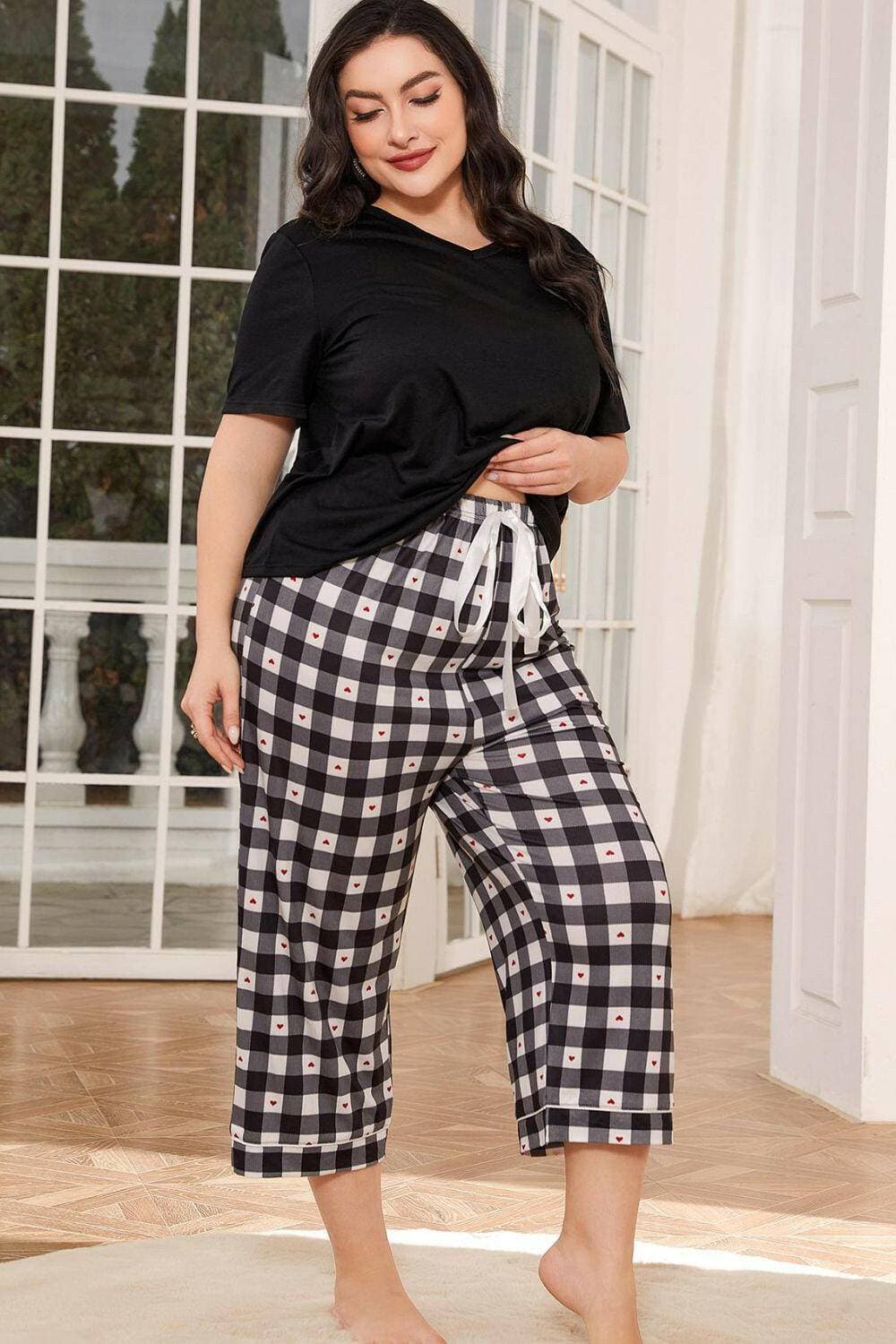 Chic Plaid V-Neck Lounge Set with Cropped PantsChic Plaid V-Neck Lounge Set with Cropped Pants
 Step into a world of comfort and sophistication with our Chic Plaid V-Neck Lounge Set. Elevate your loungewear game Love Salve -Neck Lounge Setlounge