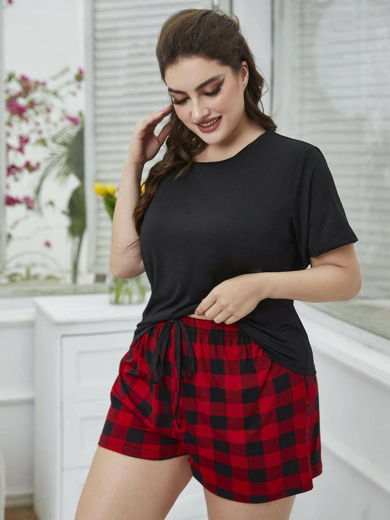 Cozy Plaid Lounge Ensemble for Curvy LadiesElevate Your Loungewear Game with Our Cozy Plaid Lounge Ensemble
 
 
Set Includes: Plus Size Round Neck Tee Shirt and Plaid Shorts
 
Minimalist Style: Trendy look wiLove Salve Cozy Plaid Lounge Ensemblelounge