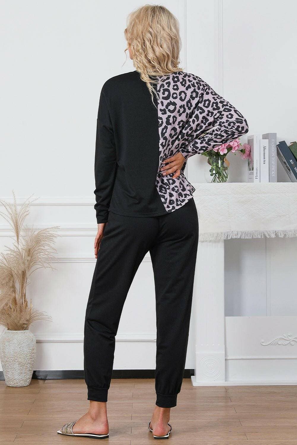 Leopard Print Cozy Lounge Set with Top and Drawstring PantsUpgrade Your Lounge Wear with our Leopard Print Cozy Lounge Set
 
 
Stand Out in Style: Embrace the trendy leopard print design for a bold and fashionable look.
 
CoLove Salve Leopard Print Cozy Lounge Setlounge