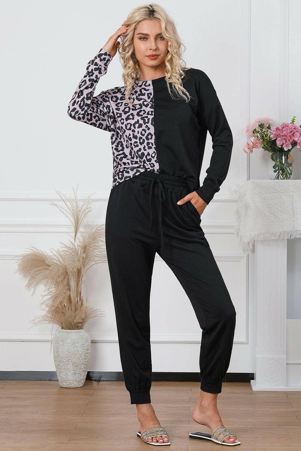 Leopard Print Cozy Lounge Set with Top and Drawstring PantsUpgrade Your Lounge Wear with our Leopard Print Cozy Lounge Set
 
 
Stand Out in Style: Embrace the trendy leopard print design for a bold and fashionable look.
 
CoLove Salve Leopard Print Cozy Lounge Setlounge