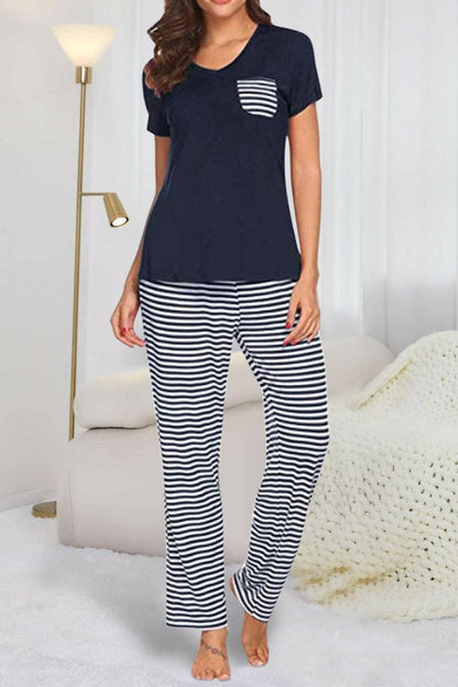 Striped Lounge Wear Set: Short Sleeve Top and Comfy PantsExperience Ultimate Comfort in Style
 Indulge in pure relaxation with our Striped Lounge Wear Set, a perfect blend of comfort and style. This set includes a pocketedLove Salve Striped Lounge Wear Setlounge