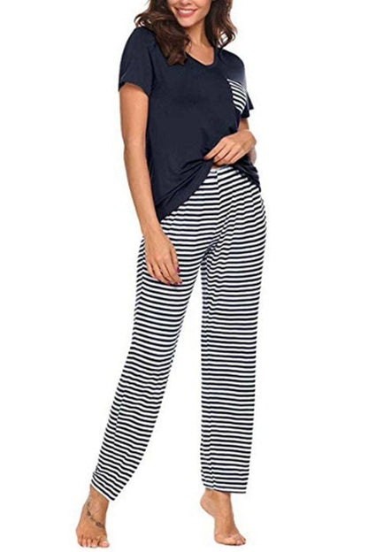 Striped Lounge Wear Set: Short Sleeve Top and Comfy PantsExperience Ultimate Comfort in Style
 Indulge in pure relaxation with our Striped Lounge Wear Set, a perfect blend of comfort and style. This set includes a pocketedLove Salve Striped Lounge Wear Setlounge