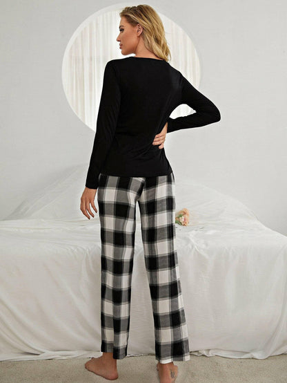 Plaid Heart V-Neck Lounge Set with TrousersPlaid Heart V-Neck Lounge Set with Trousers
 Indulge in ultimate comfort and style with our Plaid Heart Lounge Set, designed to elevate your loungewear game with itsLove Salve -Neck Lounge Setlounge