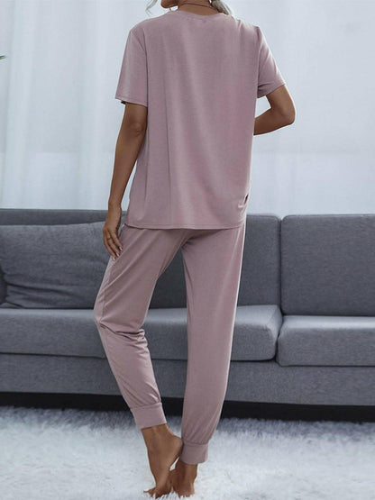 Stylish Round Neck Top and Trendy Pants Set for Fashionable LooksUpgrade Your Style with Our Stylish Round Neck Top and Trendy Pants Set
 Elevate your fashion game with our exclusive two-piece set, perfect for individuals who wantLove Salve Stylish Round Neck Toplounge