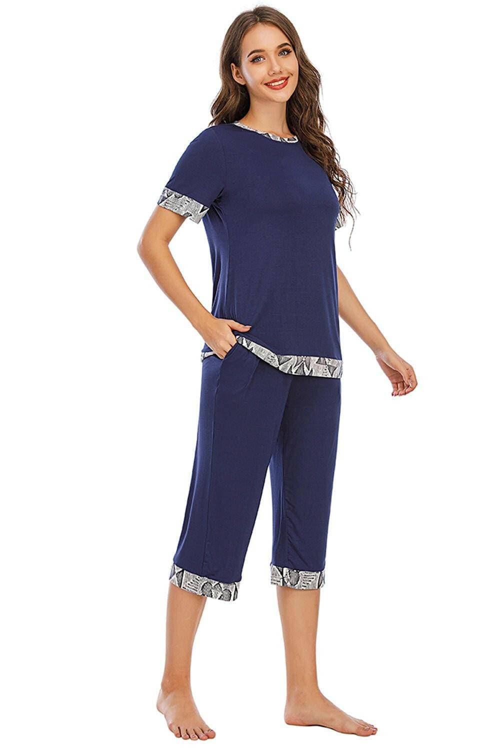 Elegant Lounge Set with Short Sleeve Top and Capri PantsElegant Lounge Set with Short Sleeve Top and Capri Pants
 Indulge in relaxation without compromising on style. Elevate your loungewear game with our Elegant Lounge SLove Salve Elegant Lounge Setlounge