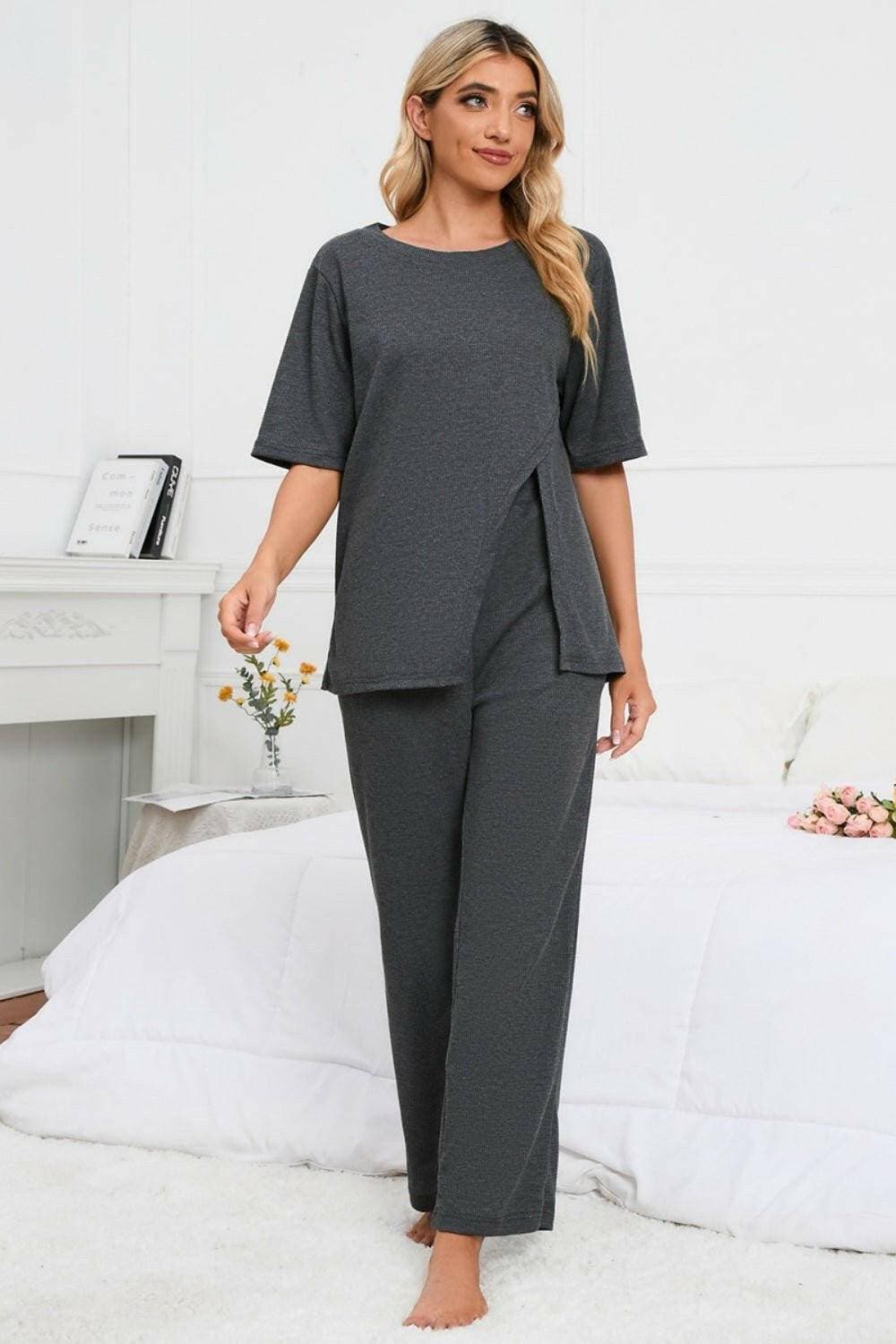 Elevate Your Loungewear Game with Coordinated Slit Neck Lounge SetElevate Your Loungewear Game with Coordinated Slit Neck Lounge Set
 Upgrade your loungewear collection with our Slit Round Neck Top and Pants Lounge Set. Embrace comLove Salve Coordinated Slit Neck Lounge Setlounge