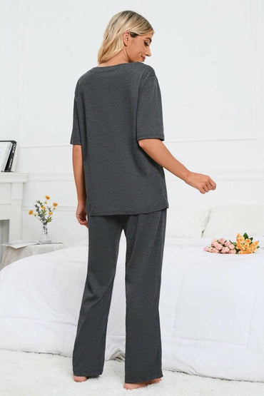 Elevate Your Loungewear Game with Coordinated Slit Neck Lounge SetElevate Your Loungewear Game with Coordinated Slit Neck Lounge Set
 Upgrade your loungewear collection with our Slit Round Neck Top and Pants Lounge Set. Embrace comLove Salve Coordinated Slit Neck Lounge Setlounge