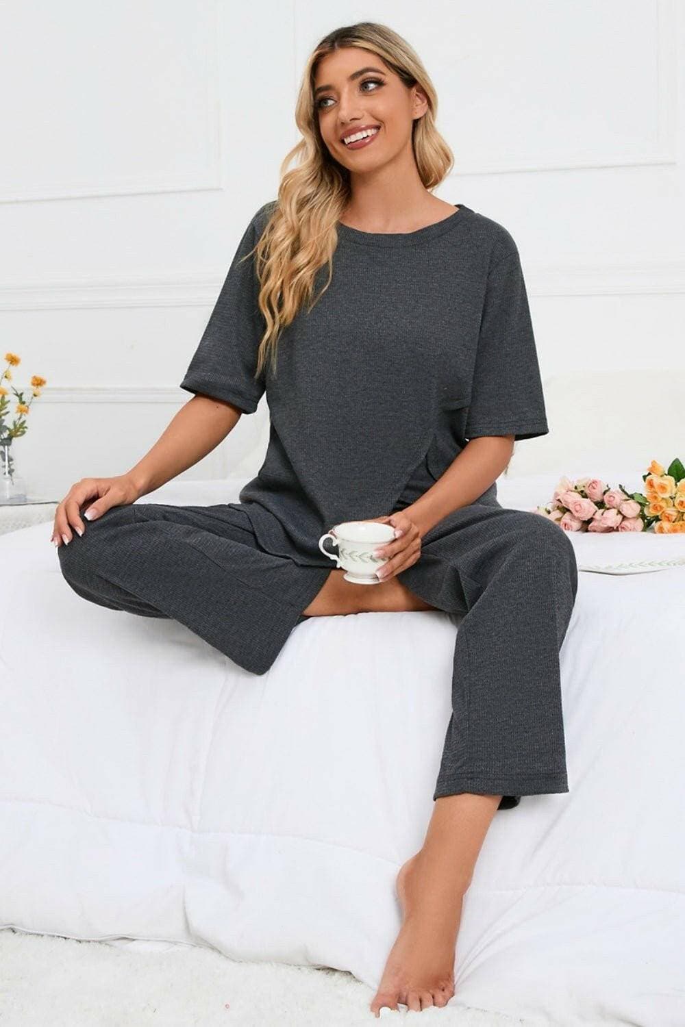 Elevate Your Loungewear Game with Coordinated Slit Neck Lounge SetElevate Your Loungewear Game with Coordinated Slit Neck Lounge Set
 Upgrade your loungewear collection with our Slit Round Neck Top and Pants Lounge Set. Embrace comLove Salve Coordinated Slit Neck Lounge Setlounge