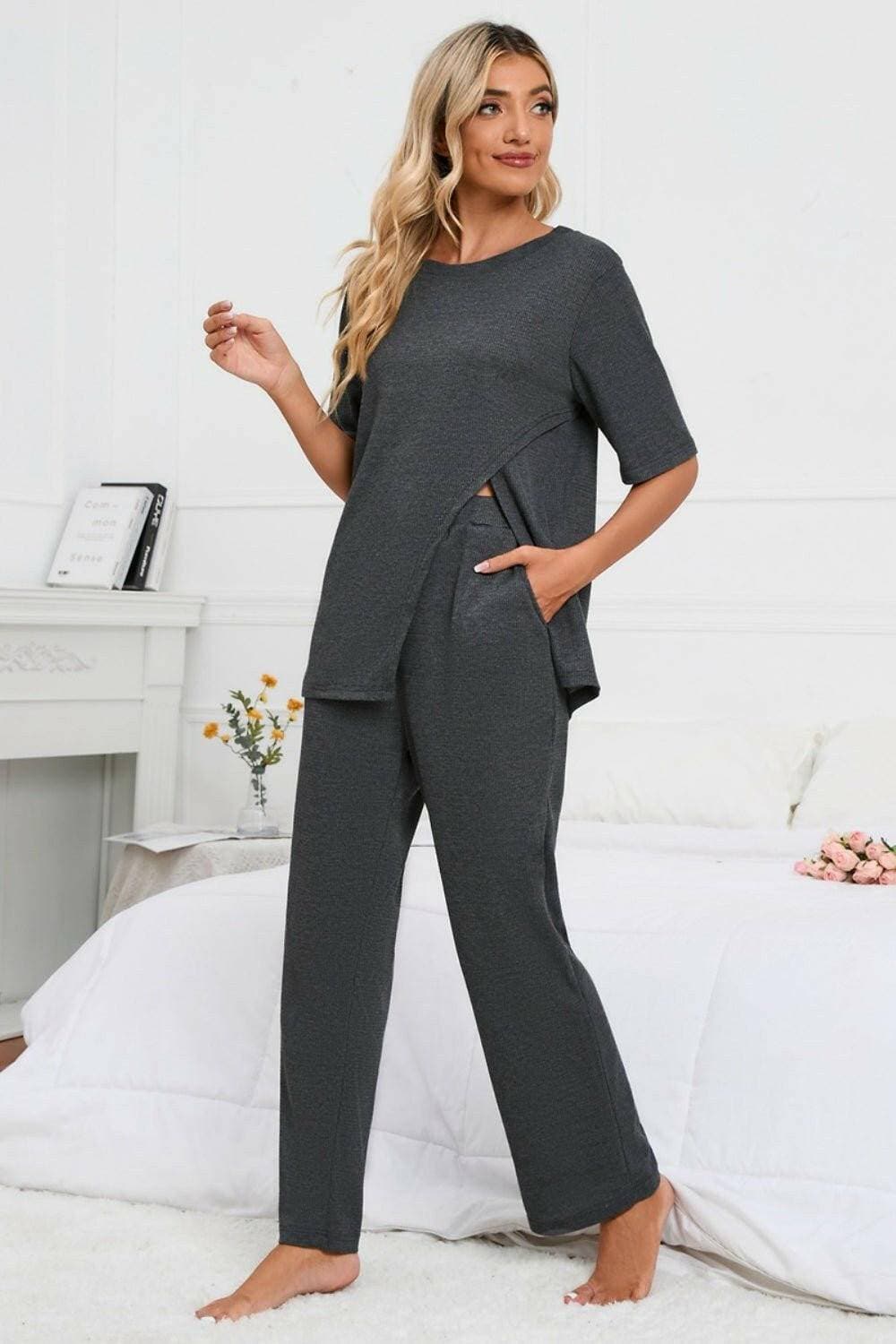 Elevate Your Loungewear Game with Coordinated Slit Neck Lounge SetElevate Your Loungewear Game with Coordinated Slit Neck Lounge Set
 Upgrade your loungewear collection with our Slit Round Neck Top and Pants Lounge Set. Embrace comLove Salve Coordinated Slit Neck Lounge Setlounge