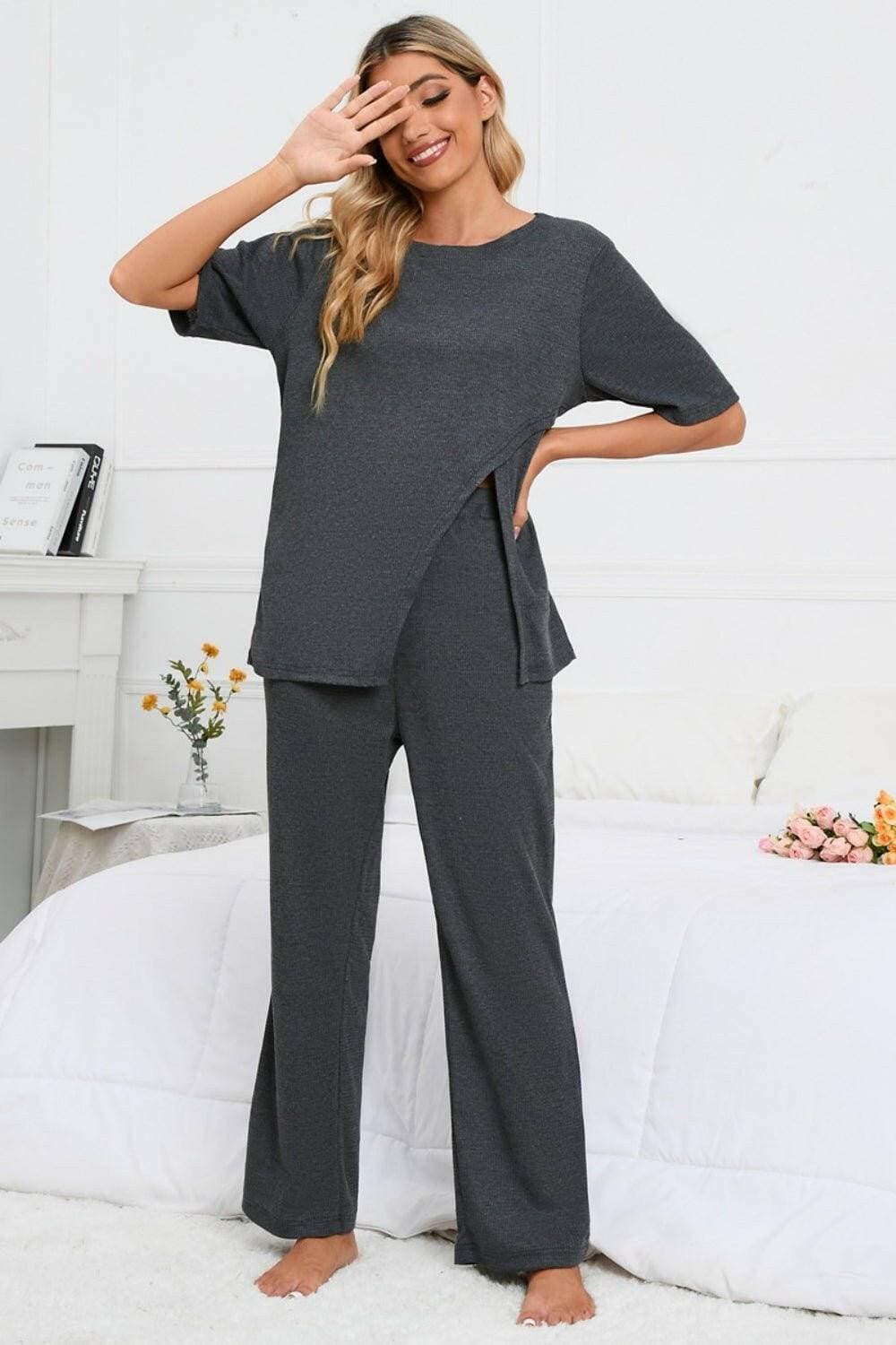 Elevate Your Loungewear Game with Coordinated Slit Neck Lounge SetElevate Your Loungewear Game with Coordinated Slit Neck Lounge Set
 Upgrade your loungewear collection with our Slit Round Neck Top and Pants Lounge Set. Embrace comLove Salve Coordinated Slit Neck Lounge Setlounge