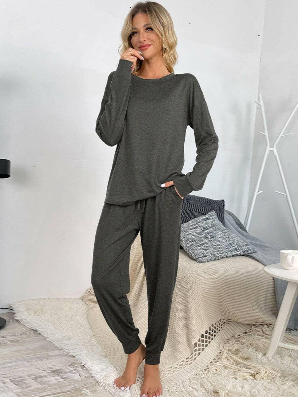 Lounge in Style: Round Neck Top and Drawstring Pants SetIndulge in Comfort and Style
 Upgrade your loungewear game with our Lounge in Style Set, featuring a chic Round Neck Top and ultra-comfortable Drawstring Pants. WhetLove Salve Round Neck Toplounge