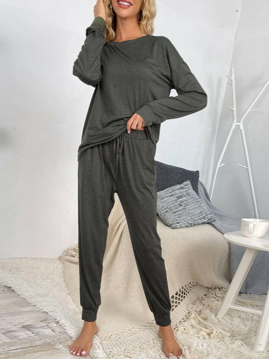 Lounge in Style: Round Neck Top and Drawstring Pants SetIndulge in Comfort and Style
 Upgrade your loungewear game with our Lounge in Style Set, featuring a chic Round Neck Top and ultra-comfortable Drawstring Pants. WhetLove Salve Round Neck Toplounge