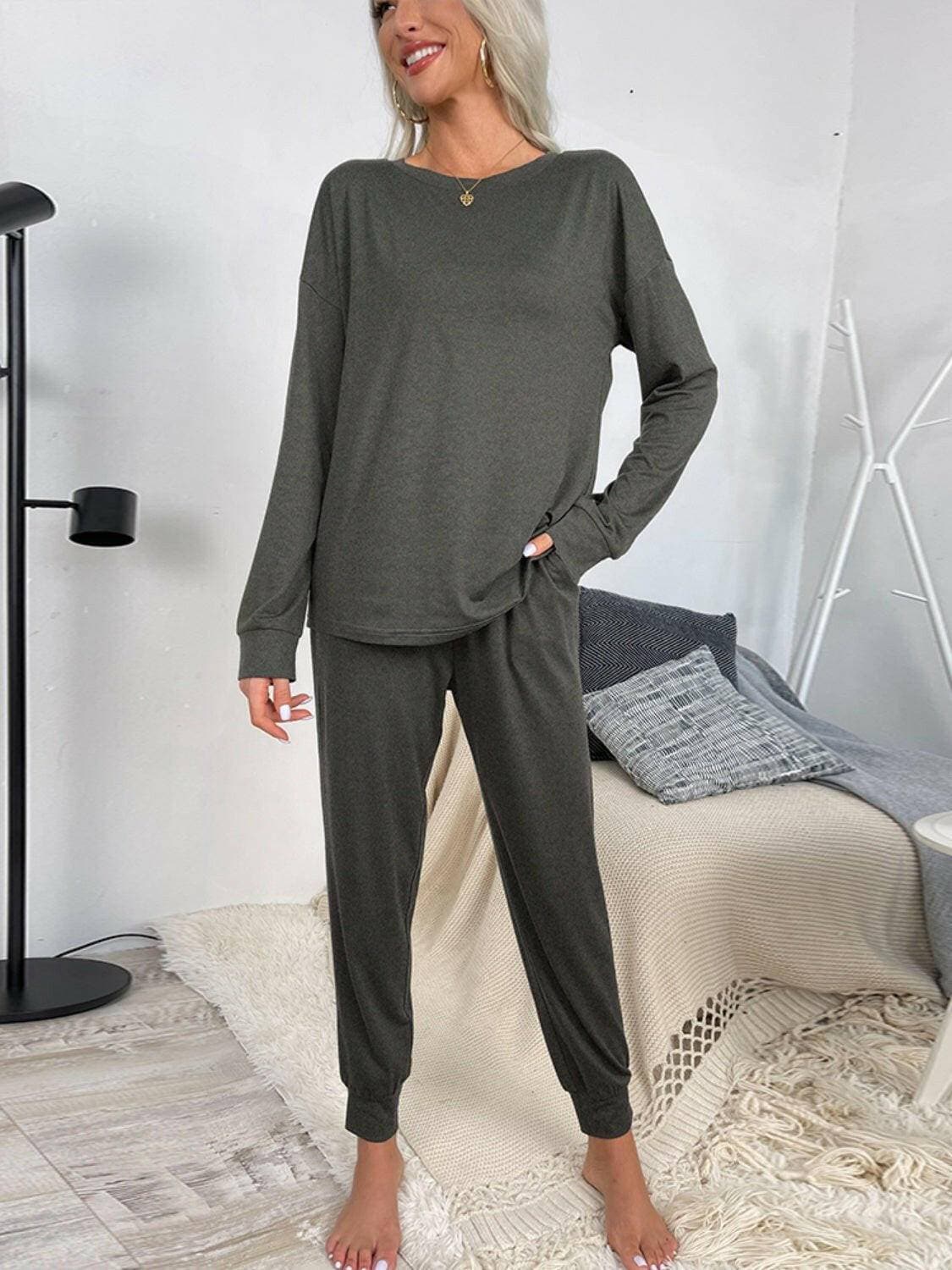 Lounge in Style: Round Neck Top and Drawstring Pants SetIndulge in Comfort and Style
 Upgrade your loungewear game with our Lounge in Style Set, featuring a chic Round Neck Top and ultra-comfortable Drawstring Pants. WhetLove Salve Round Neck Toplounge