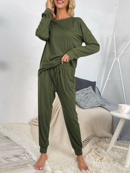 Lounge in Style: Round Neck Top and Drawstring Pants SetIndulge in Comfort and Style
 Upgrade your loungewear game with our Lounge in Style Set, featuring a chic Round Neck Top and ultra-comfortable Drawstring Pants. WhetLove Salve Round Neck Toplounge