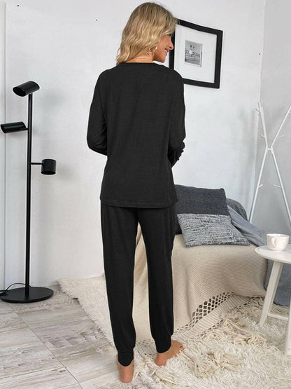 Lounge in Style: Round Neck Top and Drawstring Pants SetIndulge in Comfort and Style
 Upgrade your loungewear game with our Lounge in Style Set, featuring a chic Round Neck Top and ultra-comfortable Drawstring Pants. WhetLove Salve Round Neck Toplounge