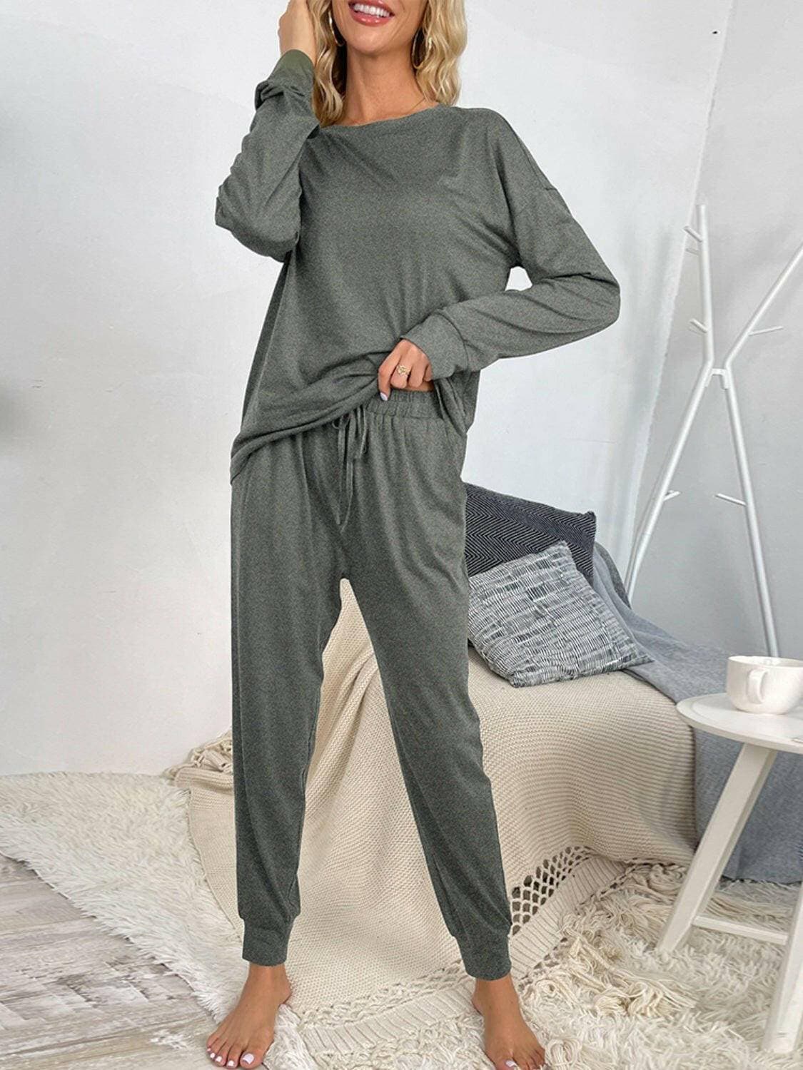 Lounge in Style: Round Neck Top and Drawstring Pants SetIndulge in Comfort and Style
 Upgrade your loungewear game with our Lounge in Style Set, featuring a chic Round Neck Top and ultra-comfortable Drawstring Pants. WhetLove Salve Round Neck Toplounge