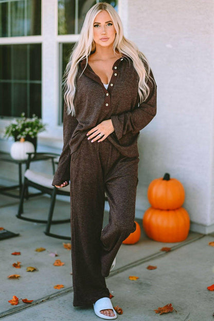 Cozy button-up lounge set with trousers, woman standing outdoors, autumn decor.