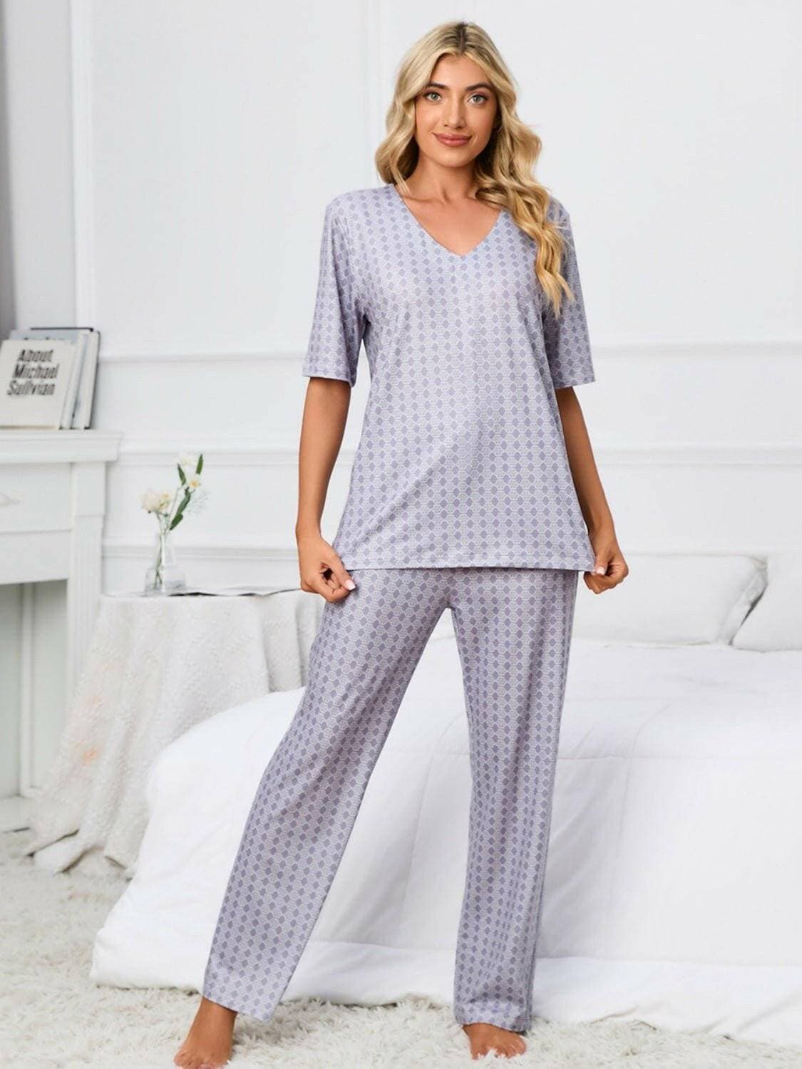 Cozy V-Neck Lounge Set with Printed Matching PantsCozy V-Neck Lounge Set with Printed Matching Pants
 Indulge in the perfect blend of comfort and style with our Cozy V-Neck Lounge Set, designed to elevate your loungLove Salve -Neck Lounge Setlounge