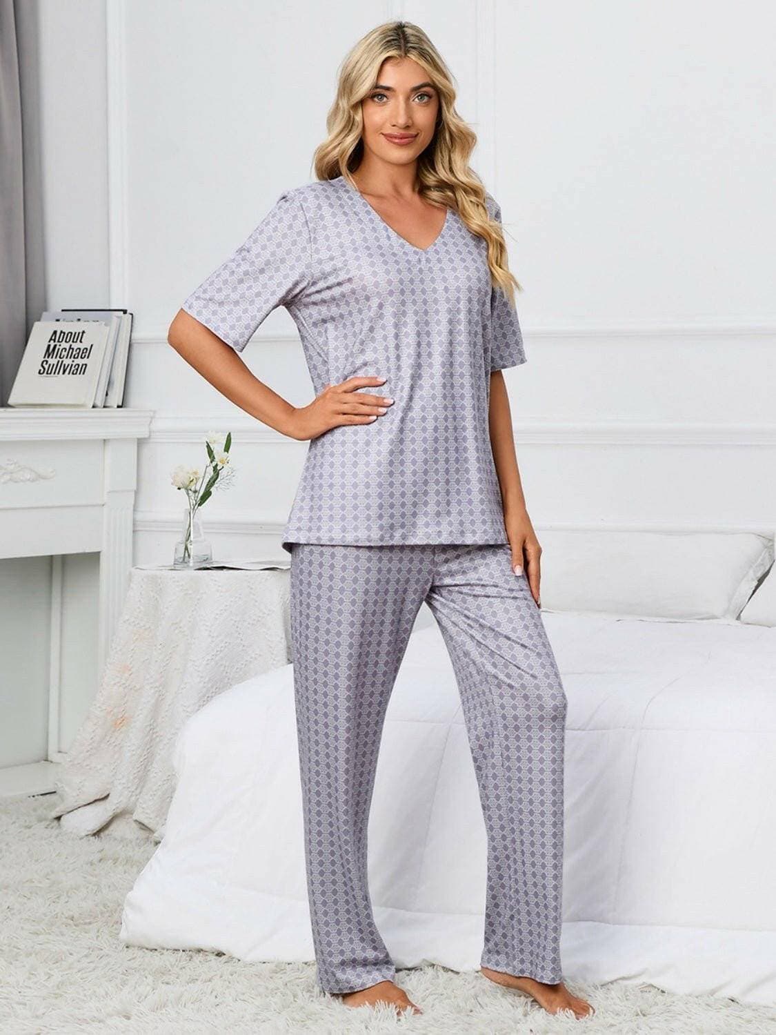 Cozy V-Neck Lounge Set with Printed Matching PantsCozy V-Neck Lounge Set with Printed Matching Pants
 Indulge in the perfect blend of comfort and style with our Cozy V-Neck Lounge Set, designed to elevate your loungLove Salve -Neck Lounge Setlounge