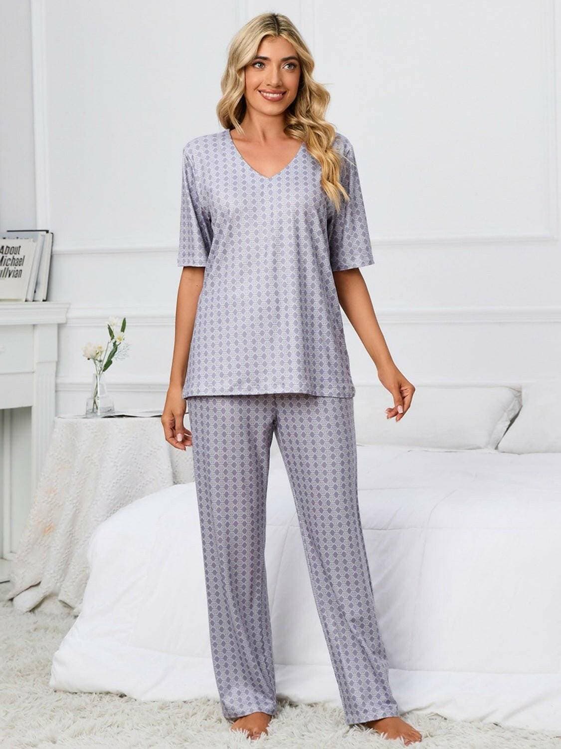 Cozy V-Neck Lounge Set with Printed Matching PantsCozy V-Neck Lounge Set with Printed Matching Pants
 Indulge in the perfect blend of comfort and style with our Cozy V-Neck Lounge Set, designed to elevate your loungLove Salve -Neck Lounge Setlounge