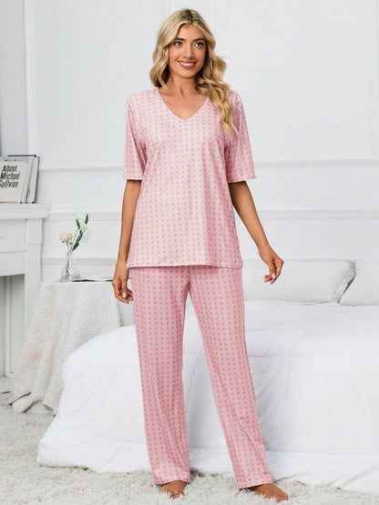 Cozy V-Neck Lounge Set with Printed Matching PantsCozy V-Neck Lounge Set with Printed Matching Pants
 Indulge in the perfect blend of comfort and style with our Cozy V-Neck Lounge Set, designed to elevate your loungLove Salve -Neck Lounge Setlounge