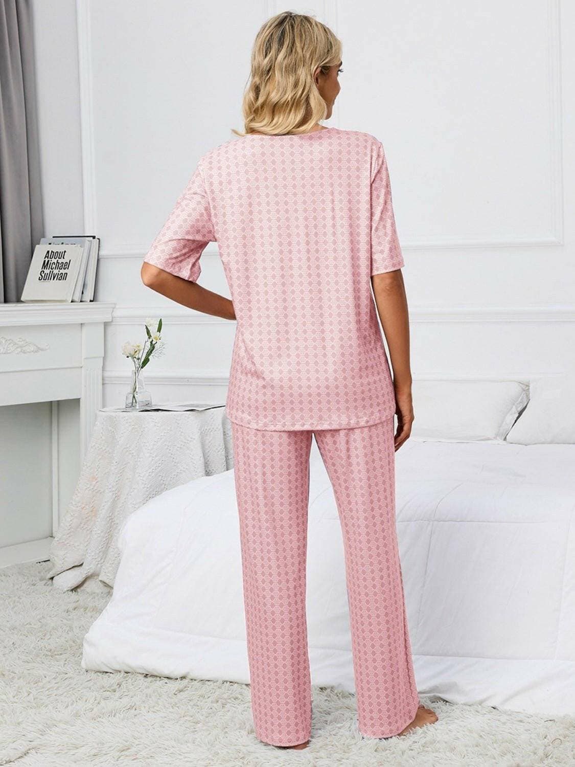 Cozy V-Neck Lounge Set with Printed Matching PantsCozy V-Neck Lounge Set with Printed Matching Pants
 Indulge in the perfect blend of comfort and style with our Cozy V-Neck Lounge Set, designed to elevate your loungLove Salve -Neck Lounge Setlounge