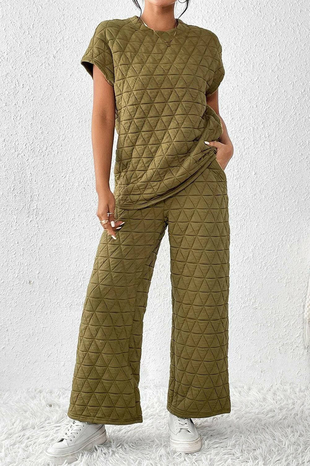 Ultimate Coziness Two-Piece Lounge Set with Trendy DetailsExperience Ultimate Coziness with our Two-Piece Lounge Set
 
 Stay cozy and chic in this trendy lounge set
 Short sleeve top and pocketed pants for a fashionable looLove Salve -Piece Lounge Setlounge