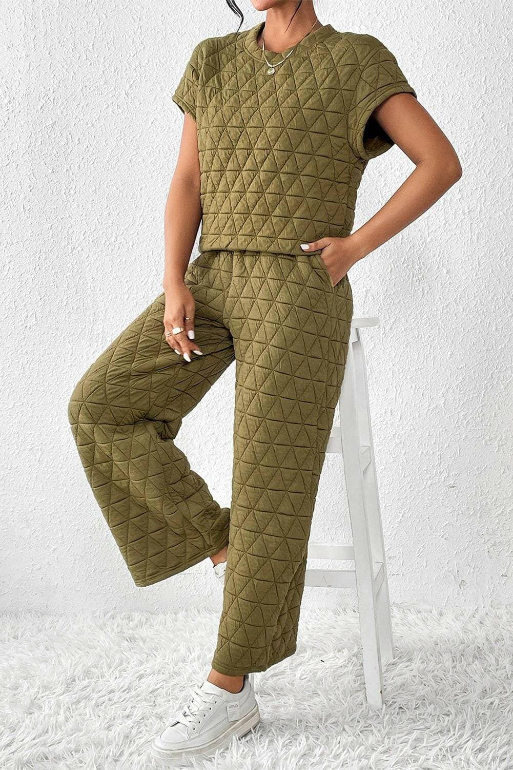 Ultimate Coziness Two-Piece Lounge Set with Trendy DetailsExperience Ultimate Coziness with our Two-Piece Lounge Set
 
 Stay cozy and chic in this trendy lounge set
 Short sleeve top and pocketed pants for a fashionable looLove Salve -Piece Lounge Setlounge