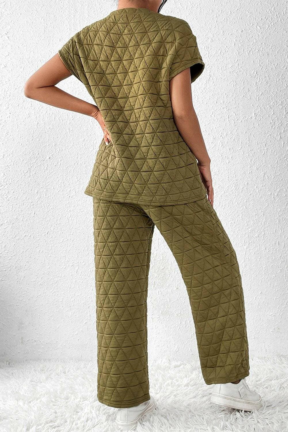 Ultimate Coziness Two-Piece Lounge Set with Trendy DetailsExperience Ultimate Coziness with our Two-Piece Lounge Set
 
 Stay cozy and chic in this trendy lounge set
 Short sleeve top and pocketed pants for a fashionable looLove Salve -Piece Lounge Setlounge